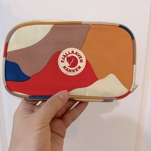 Fjallraven kanken travel wallet.